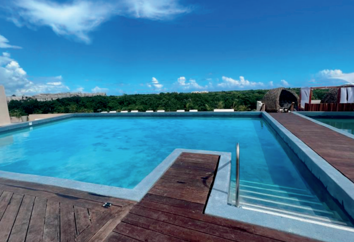 Sky Poolside Deck Over Water — Secrets Tulum