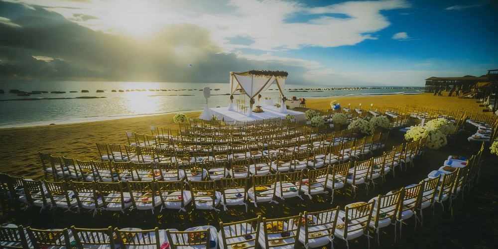 Generations Beach reception setup — Generations Riviera Maya destination wedding venue