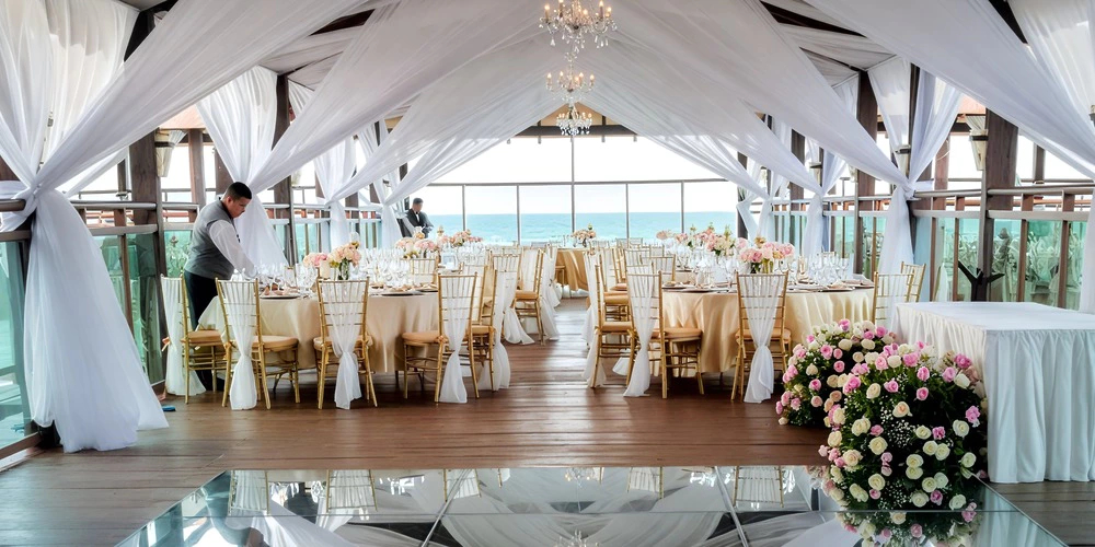 Chef Market Pier evening cocktail setup — Generations Riviera Maya wedding venue