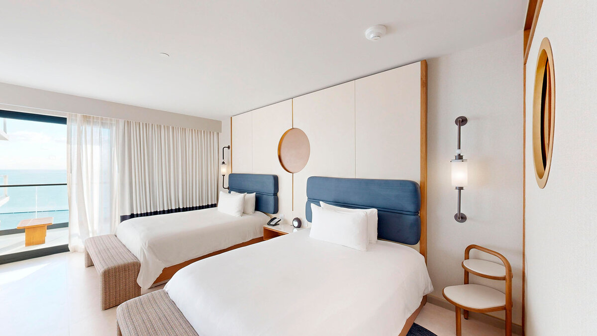 Oceanfront Two Queen Room — AVA Resort Cancun