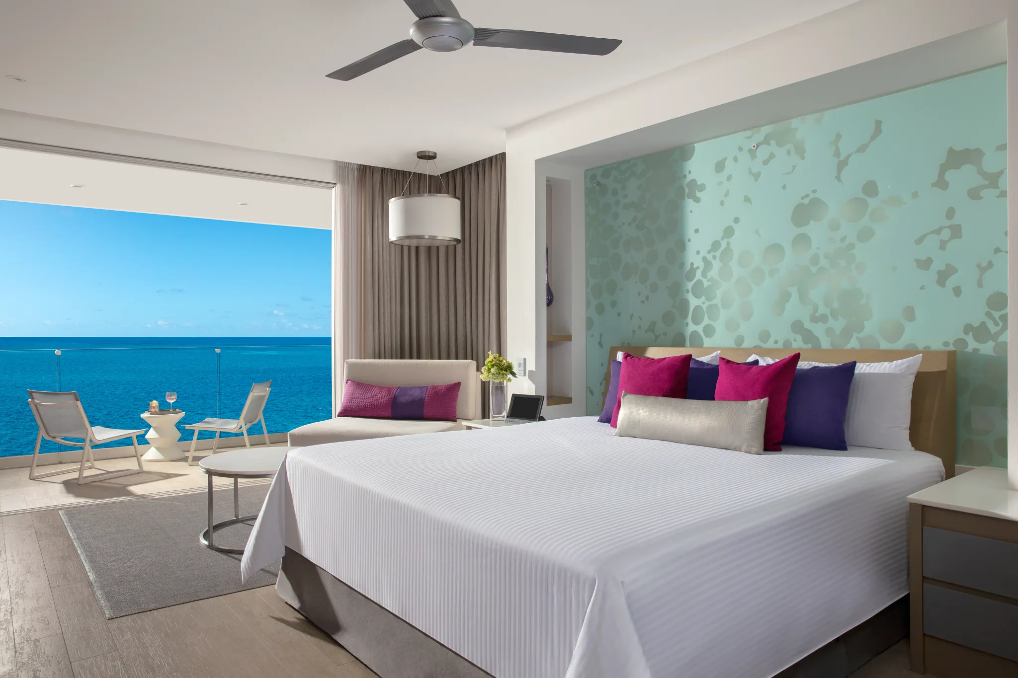 xcelerate Junior Suite Ocean Front — king bed oceanfront view