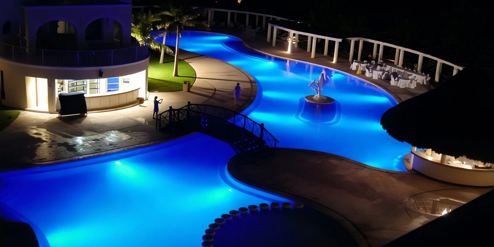 Dolphin Pool Terrace Evening — Dreams Tulum