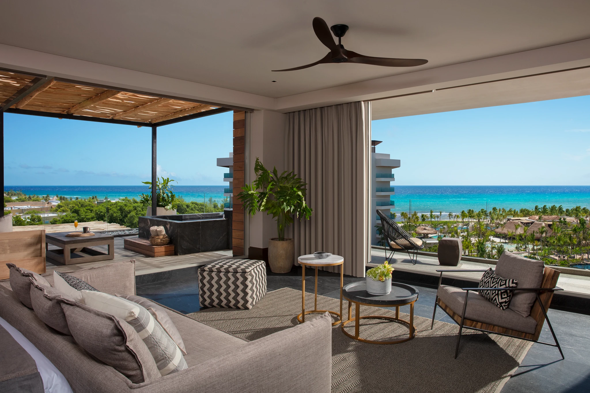 Preferred Club Paramount Suite Ocean View living room — Secrets Moxché