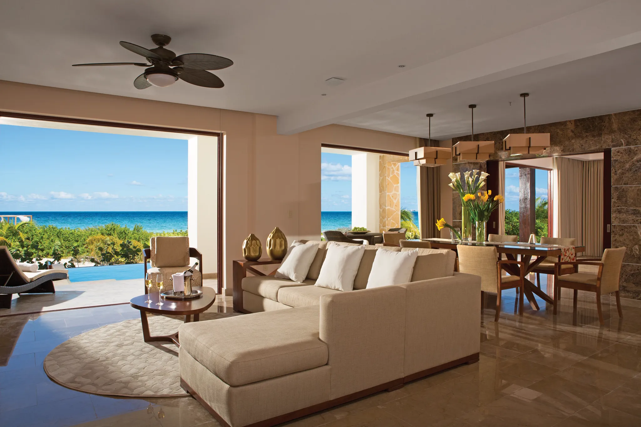 Presidential Suite living and dining area — Secrets Playa Mujeres