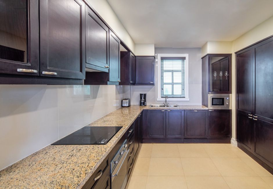 Three Bedroom Oceanfront Butler Villa Kitchen