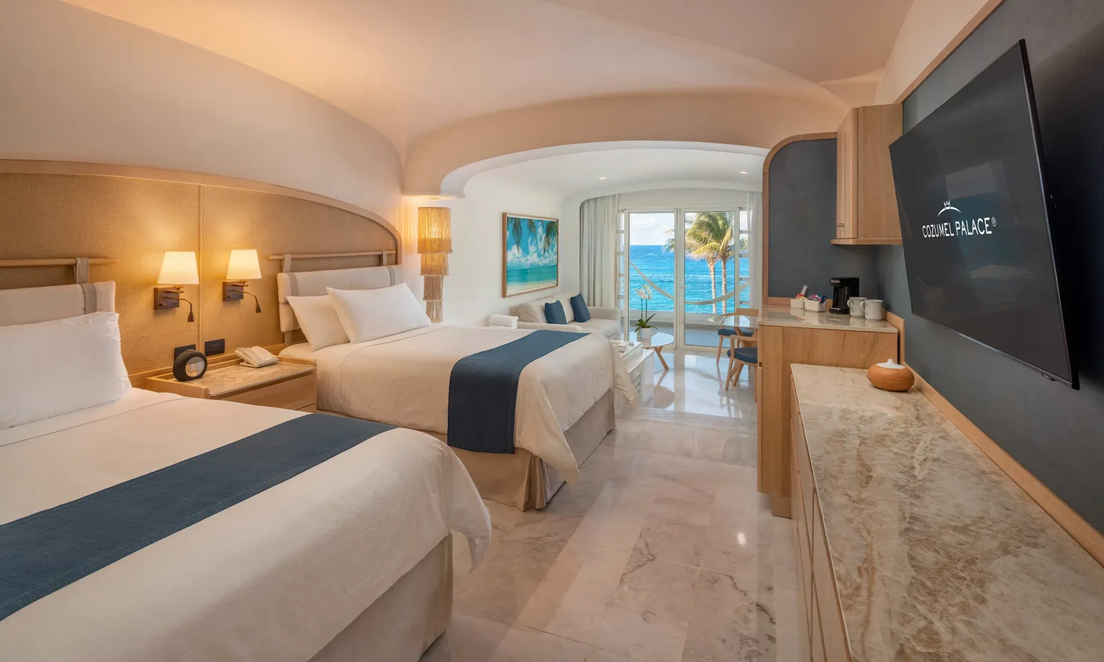 Superior Ocean View Suite double beds — Palace Cozumel