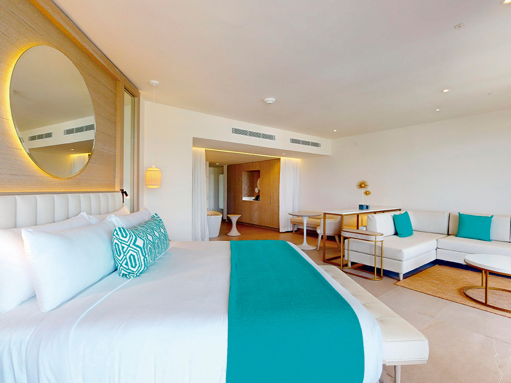 Princess Luxury Junior Suite king bed — Princess Grand Jamaica