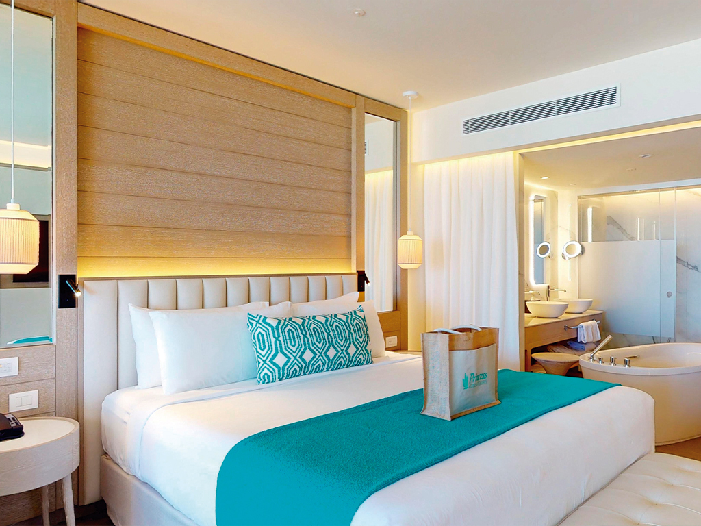 Swim-Out Platinum Junior Suite seating area — Princess Grand Jamaica