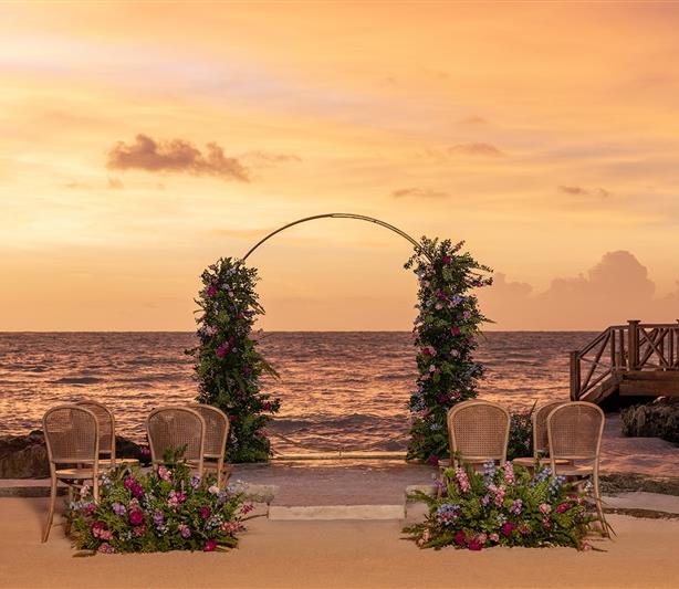 Aqua Bar sunset oceanfront ceremony — Sanctuary Cap Cana destination wedding