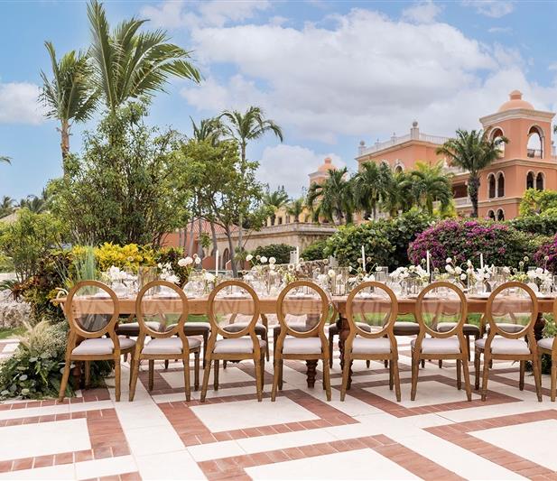 Casabella Patio garden dining with colonial backdrop — Sanctuary Cap Cana destination wedding