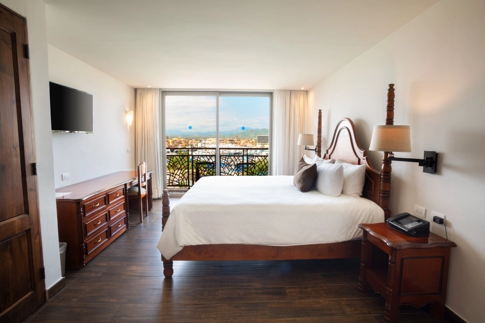 Casita Suite king bed at Sandos Finisterra