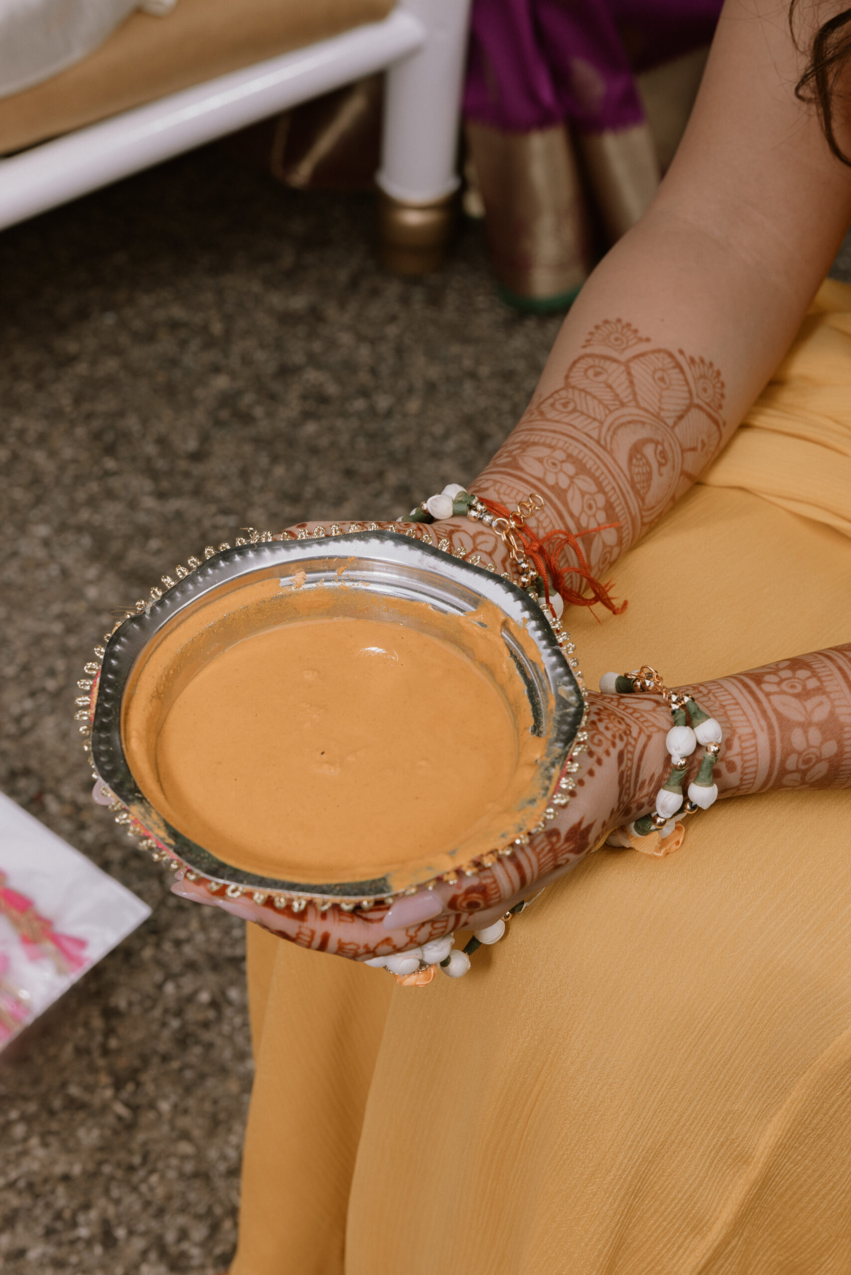 Haldi ceremony with turmeric paste