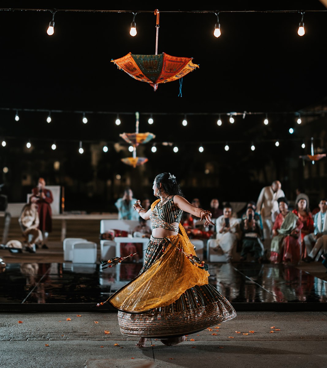 Sangeet celebration with dancing and lights