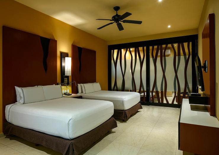Oceanfront Two-Bedroom Suite double beds — Generations Riviera Maya